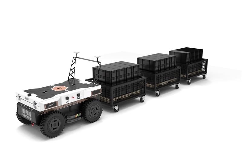 ASSIST M1 wheeled autonomous electric carrier towing three industrial material trolleys